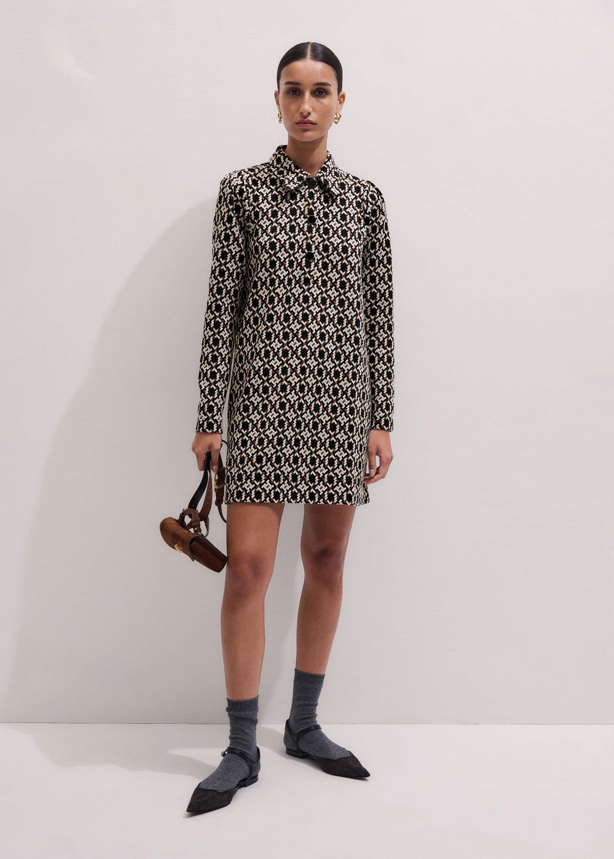 ME+EM Clothing ME+EM's Navy Graphic Jacquard Short A-Line Dress is crafted from soft jersey in a graphic blend of colors. Shop now.